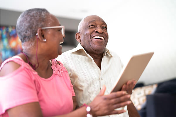 picture of a person using their phone to apply